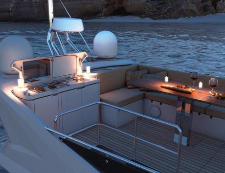 Dans le prolongement du cockpit, on retrouve un « wet-bar » avec barbecue, évier et planche à découper... Nautisme Article