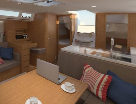 La cuisine en L comporte de nombreux rangements, avec à tribord une table à cartes ainsi qu'un emplacement pour l'instrumentation de navigation. Nautisme Article