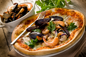 La pizza blanche aux fruits de mer : l’iode sans la tomate