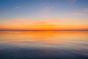 Pourquoi le ciel se pare-t-il de rouge et d’orange au coucher du soleil en été ?